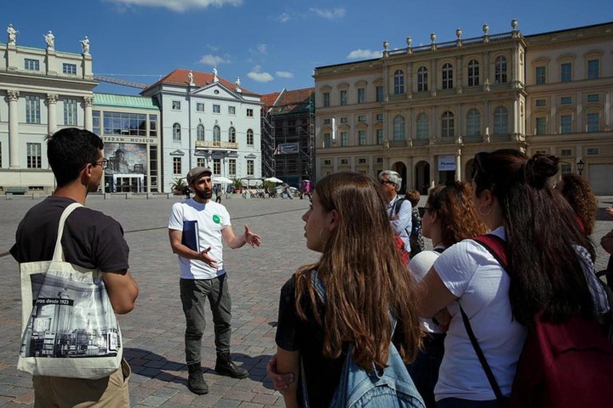 a group of people standing around in a courtyard