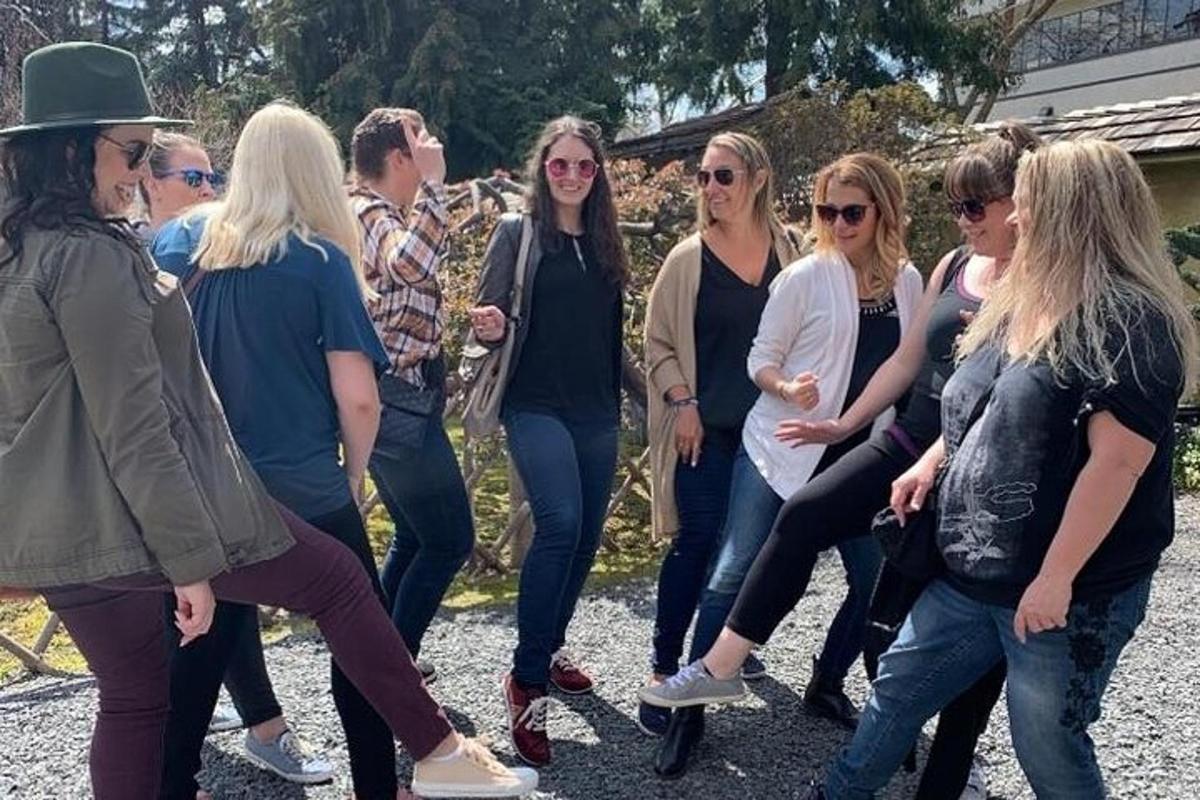 a group of people are posing for a picture