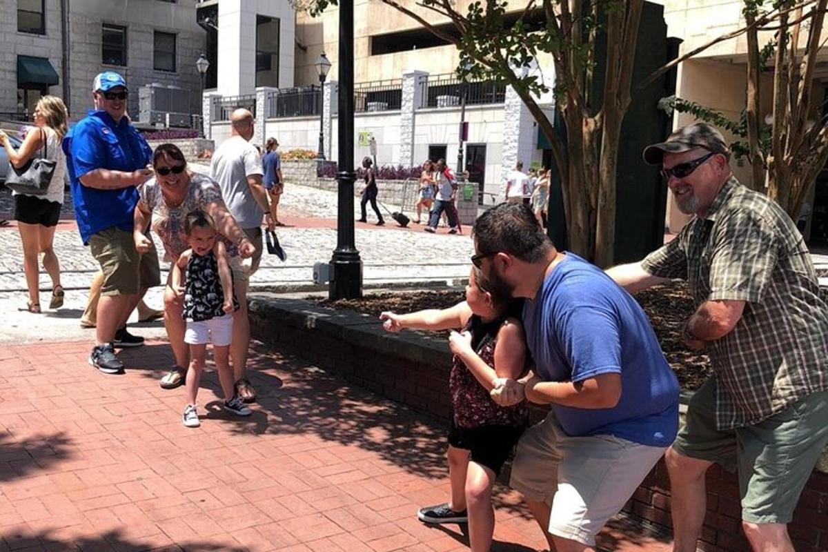 a group of people standing on a sidewalk