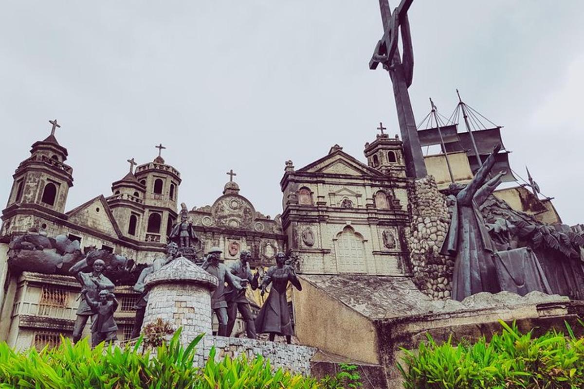 a statue of people standing in front of a building