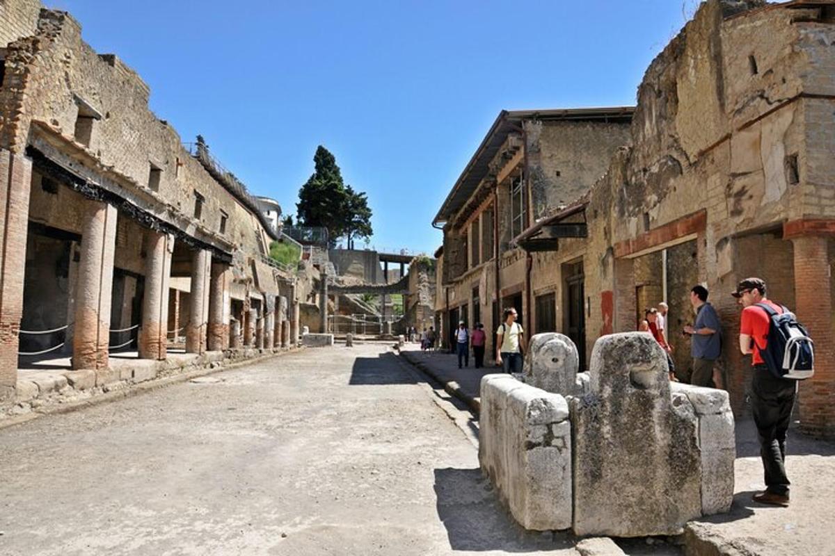 a group of people walking down a street