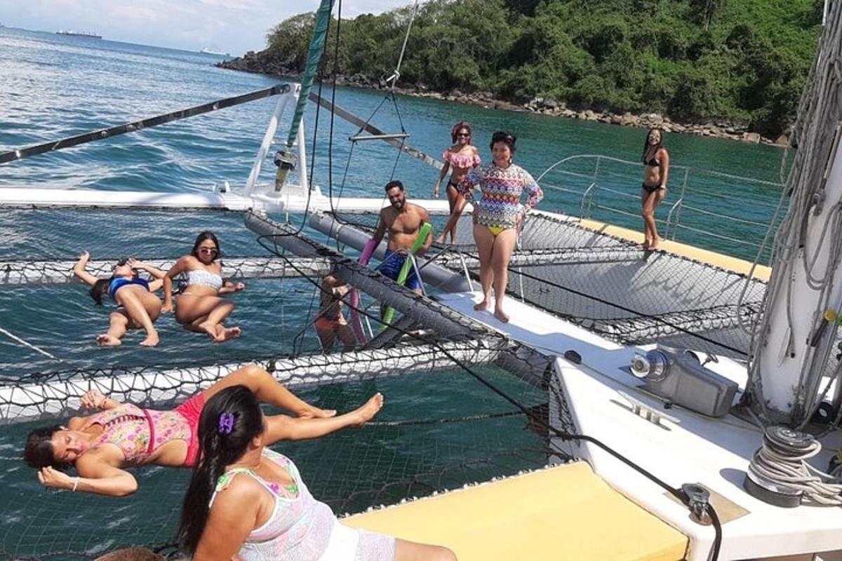 a group of people on a boat in the water