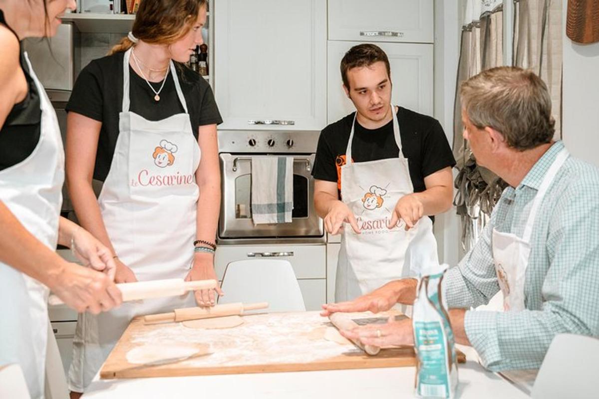 a group of people in a kitchen preparing food