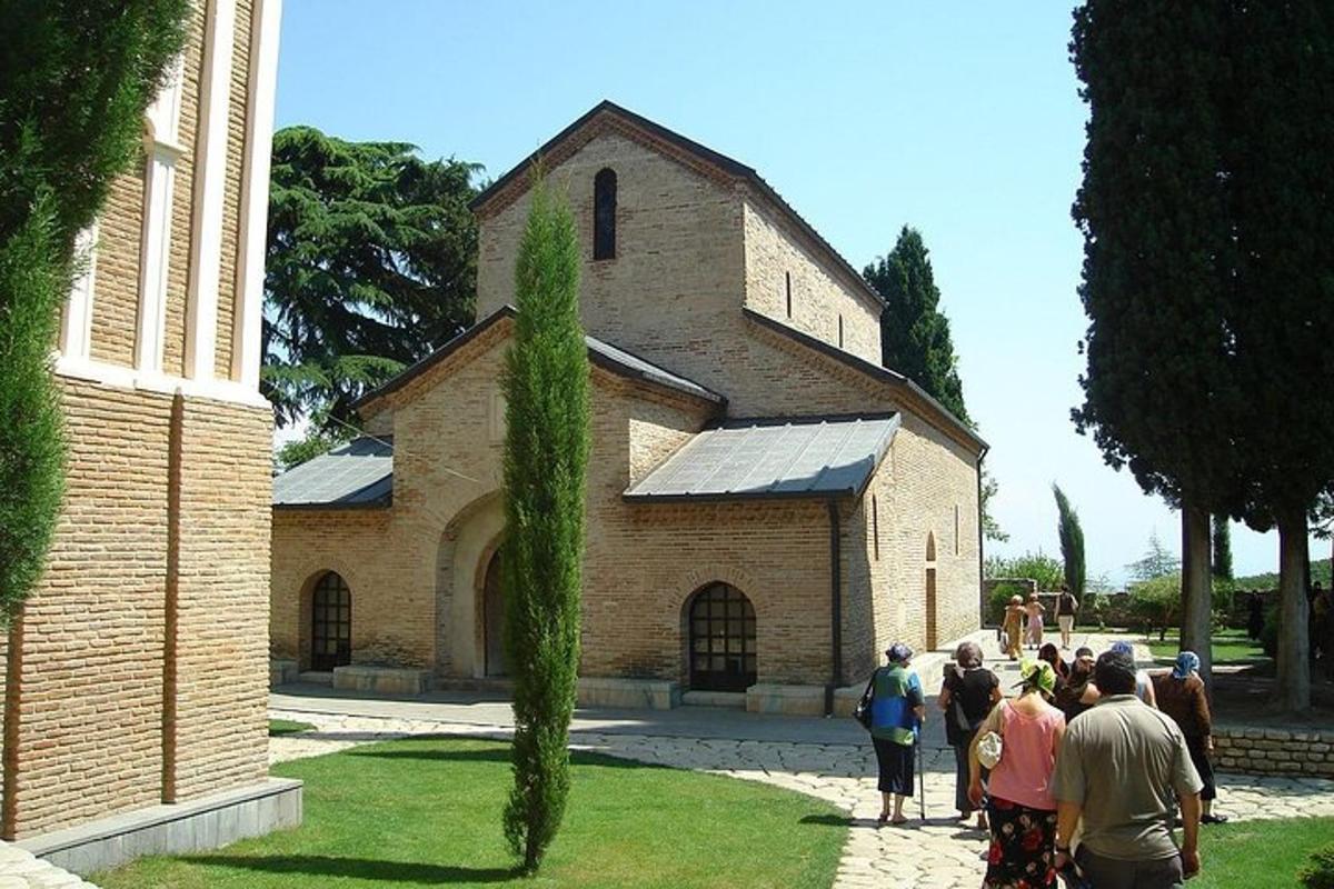 a group of people standing in front of a church