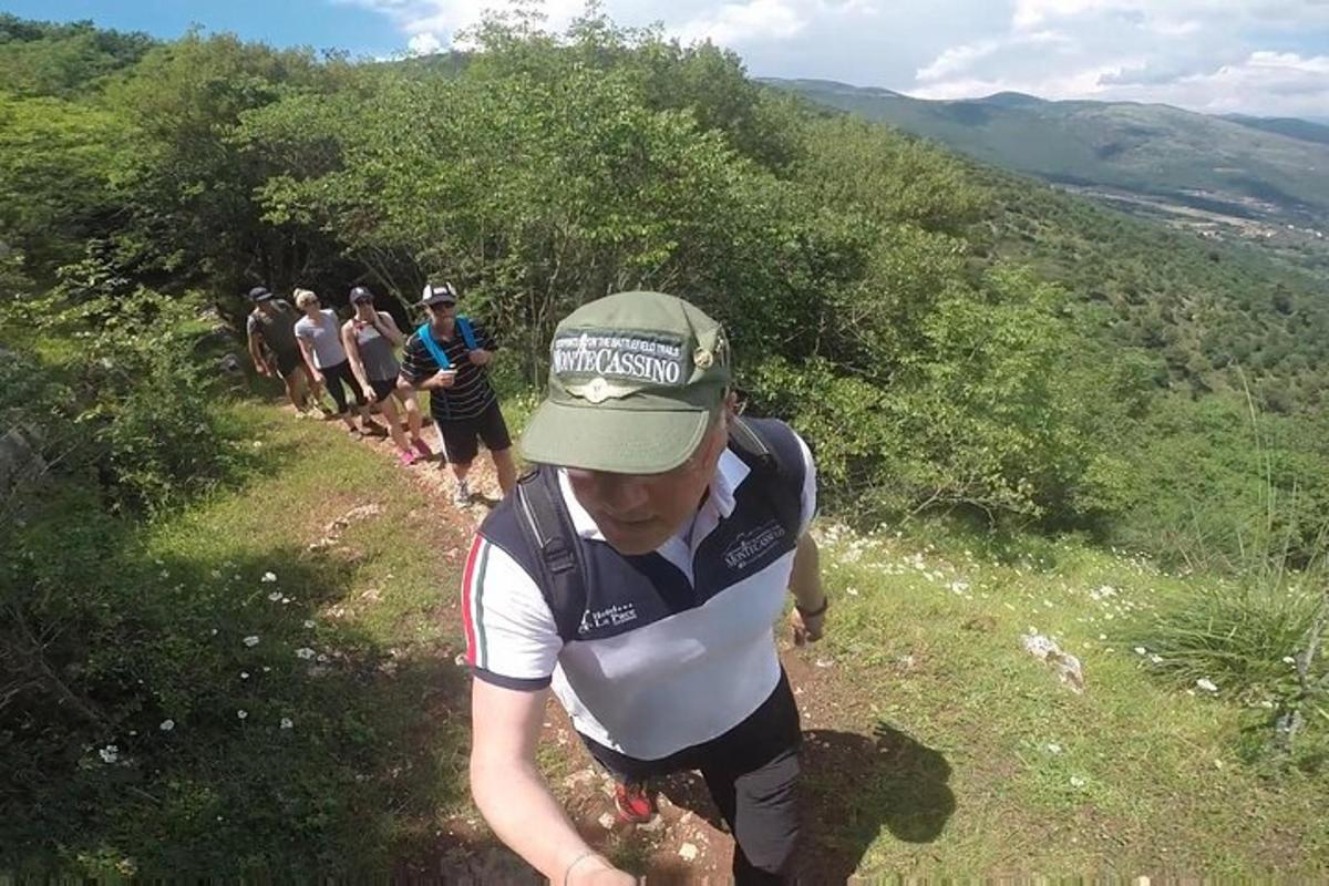 a group of people walking down a trail