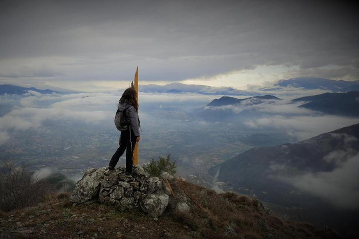 a person standing on top of a mountain