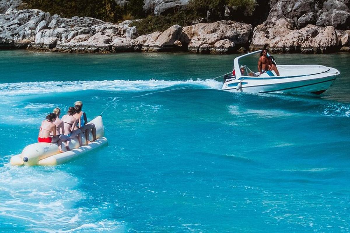 a group of people riding on a boat in the water