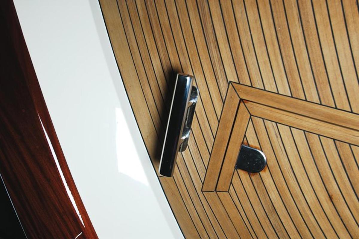 a wooden door with a black door knob on it