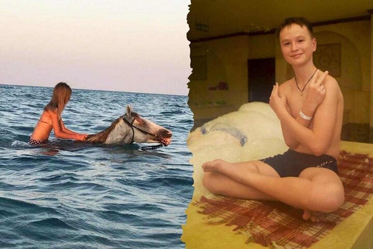 a young boy sitting on an inflatable iceberg in the water