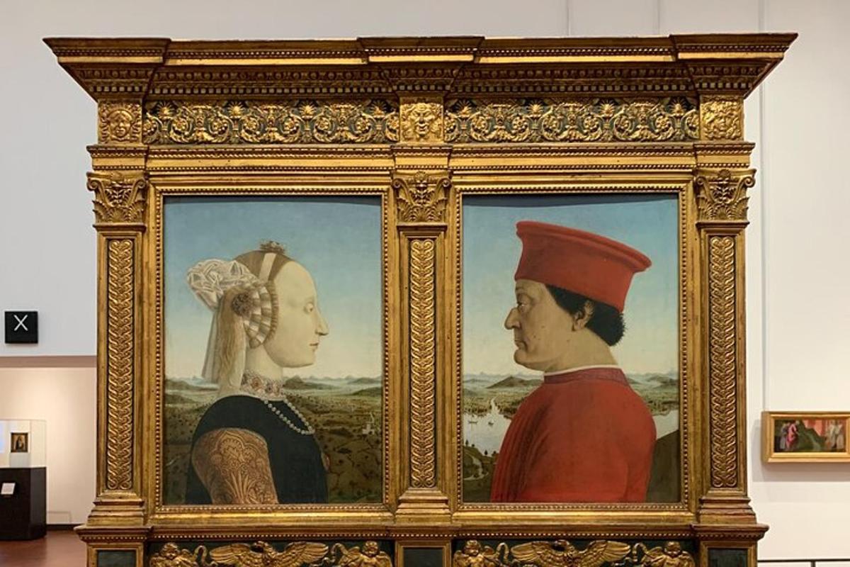 un dipinto incorniciato di un uomo e una donna