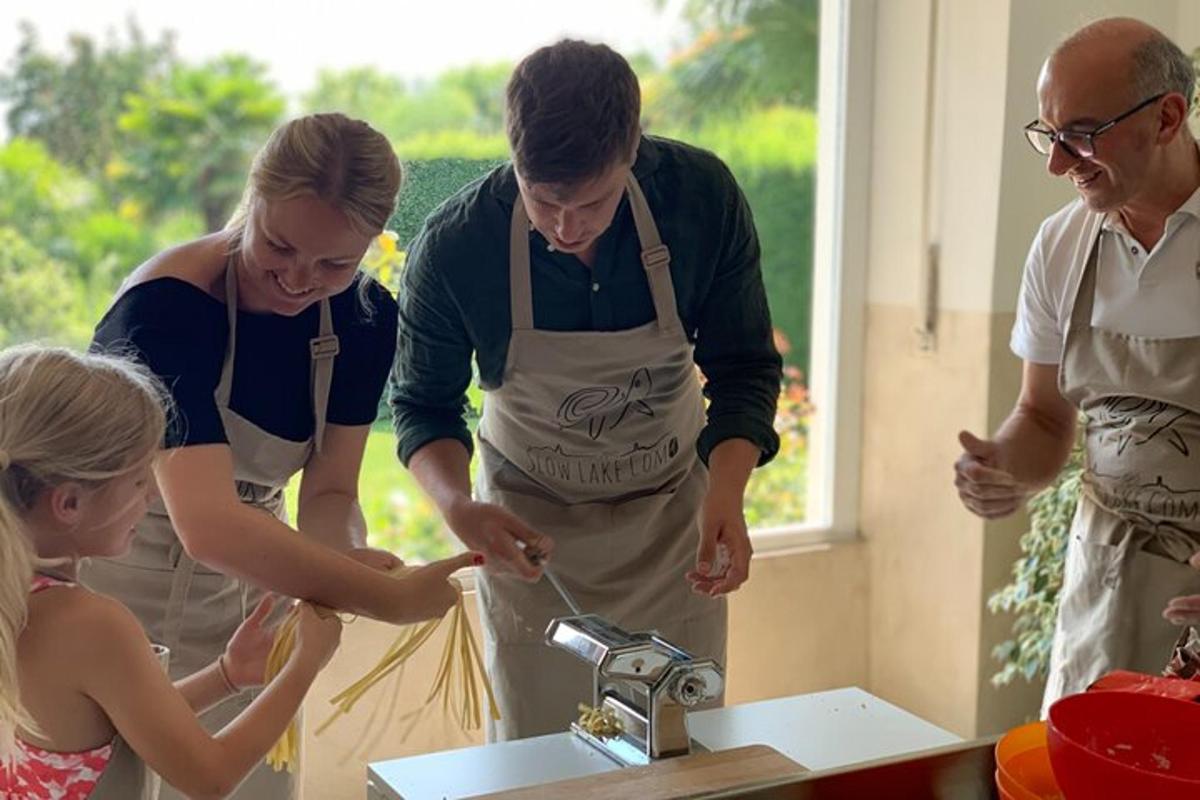 a group of people in a kitchen preparing food