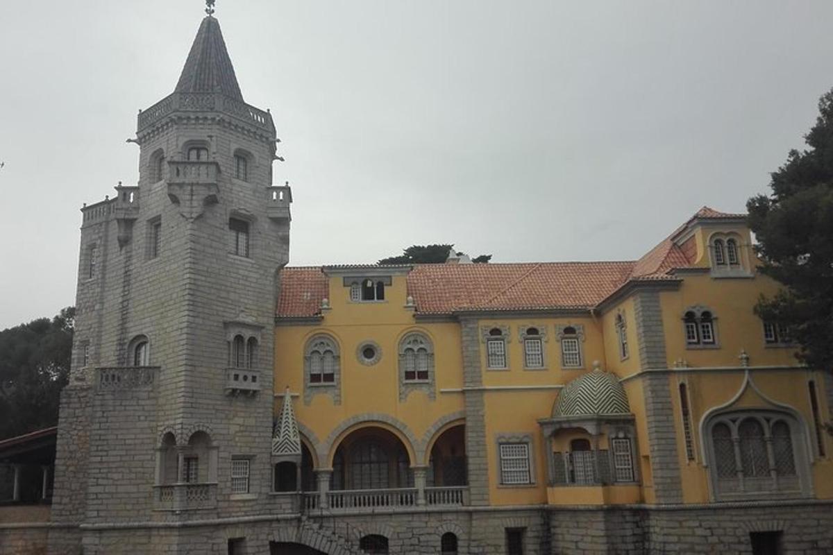 a large building with a tower and a turret