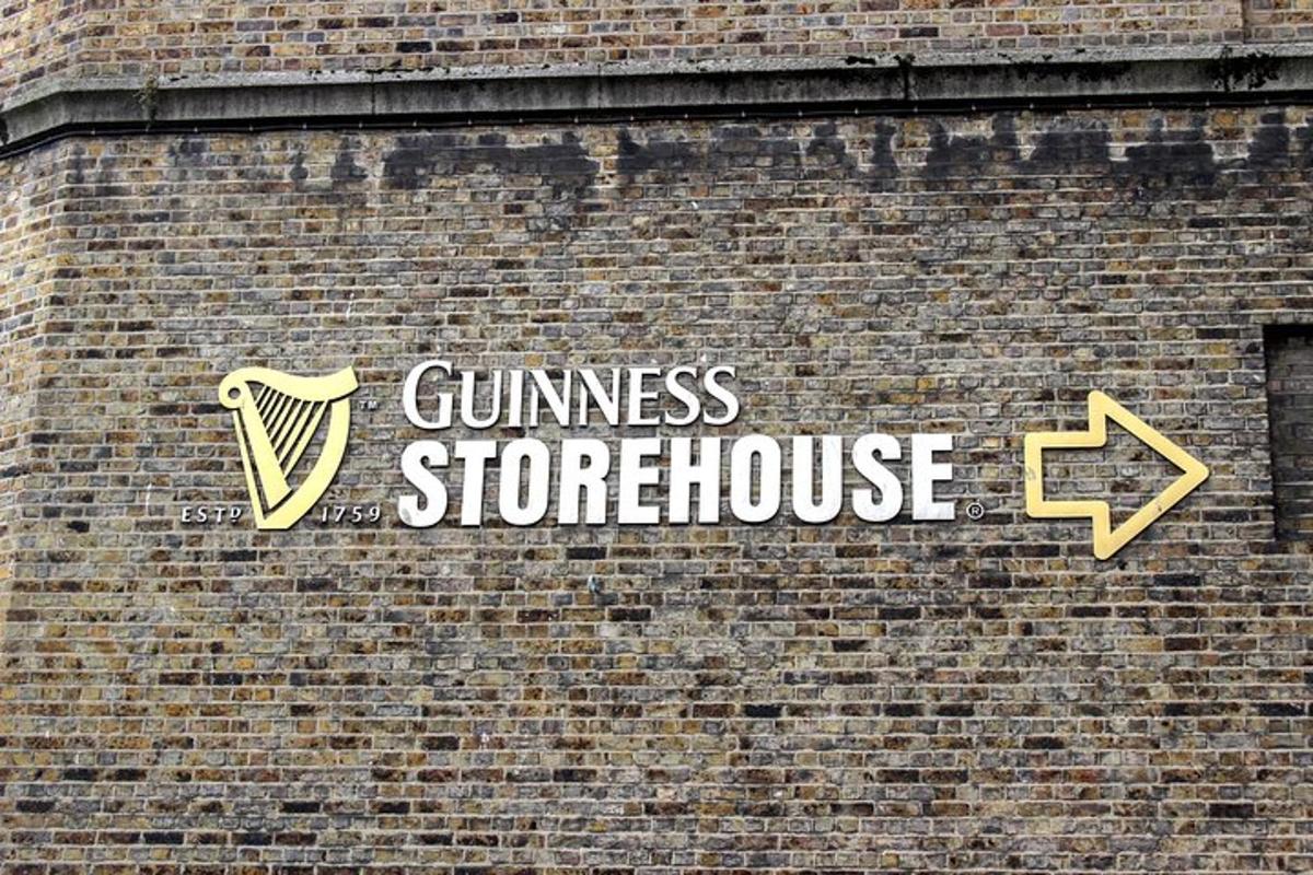 a sign on the side of a brick building
