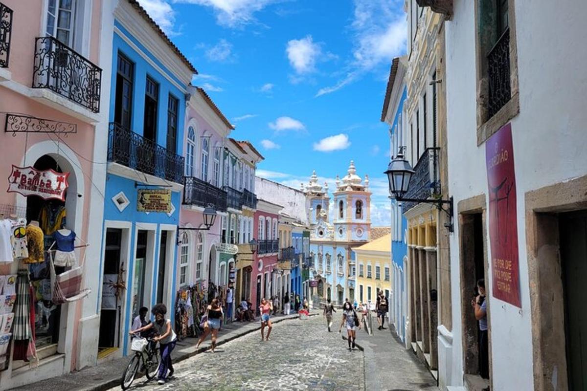 a group of people riding bikes down a street