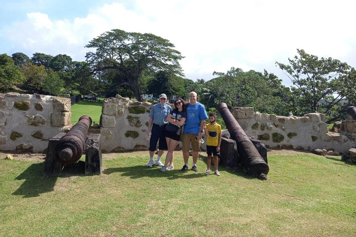 a group of people standing in front of a castle