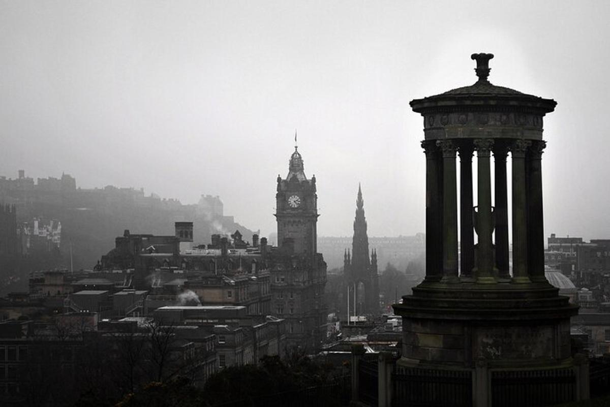 a city with a clock tower and a city