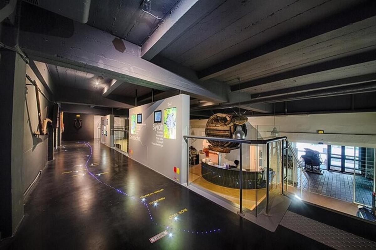a hallway of a building with a exhibit in it