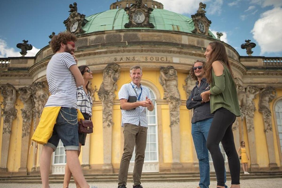 a group of people standing in front of a building
