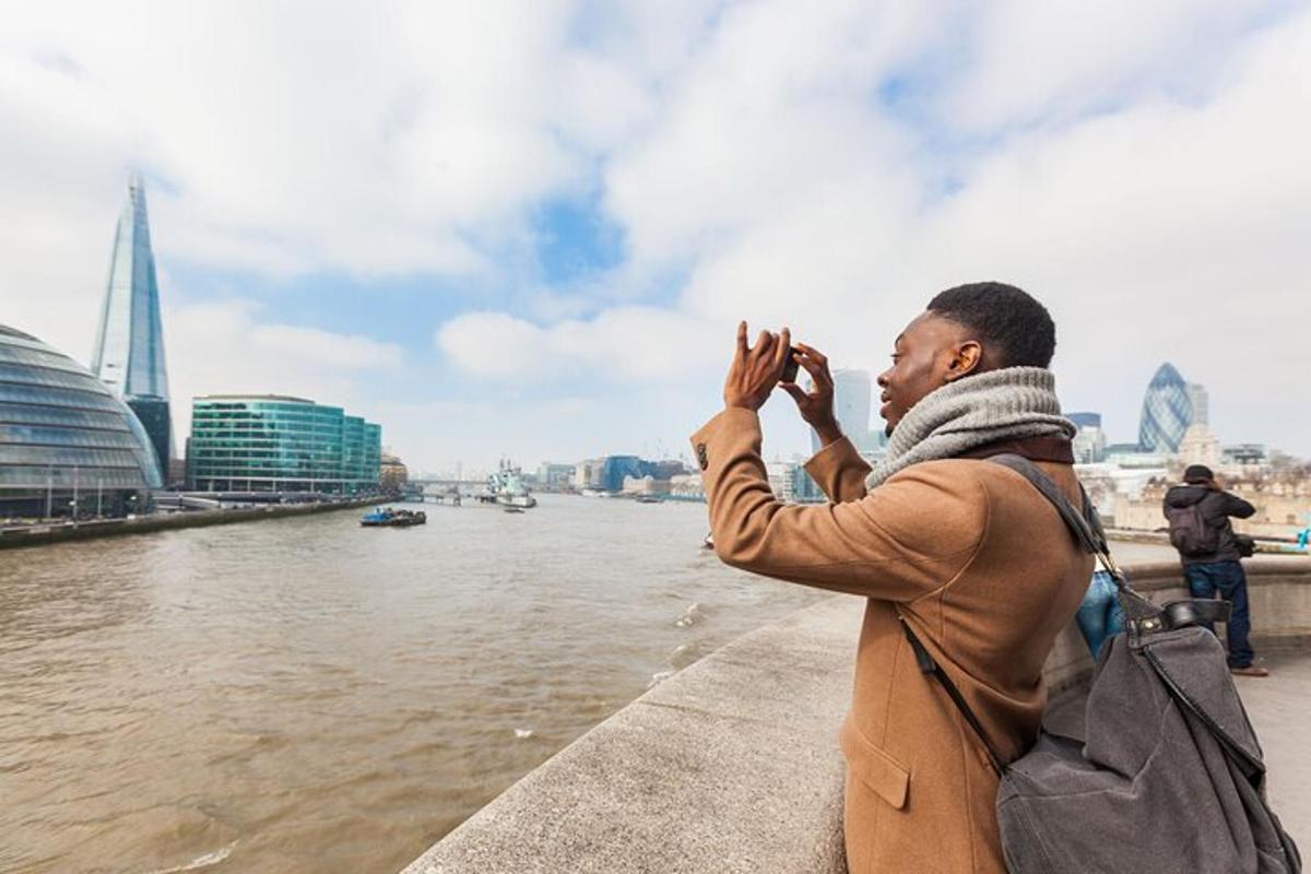 a man taking a picture of the river