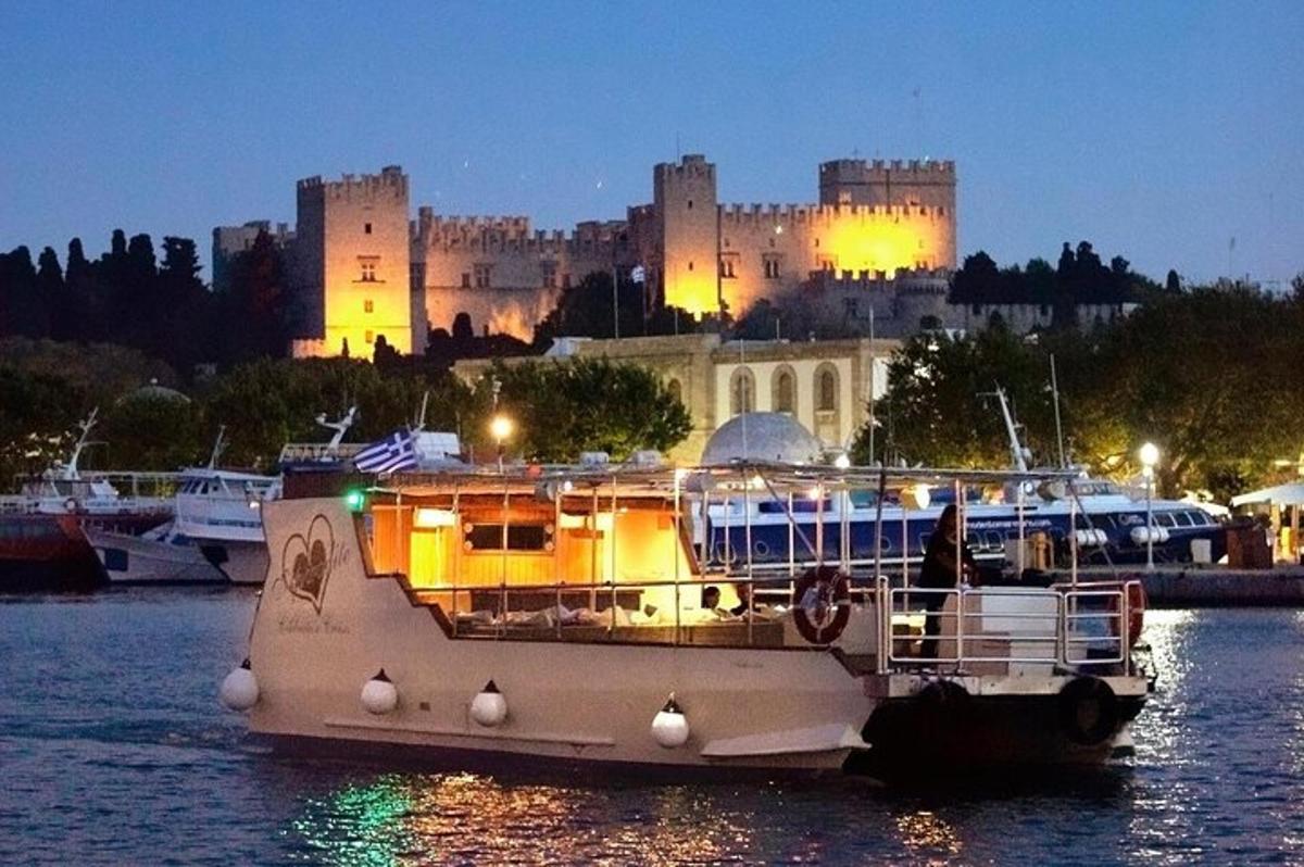 a boat in the water with a castle in the background