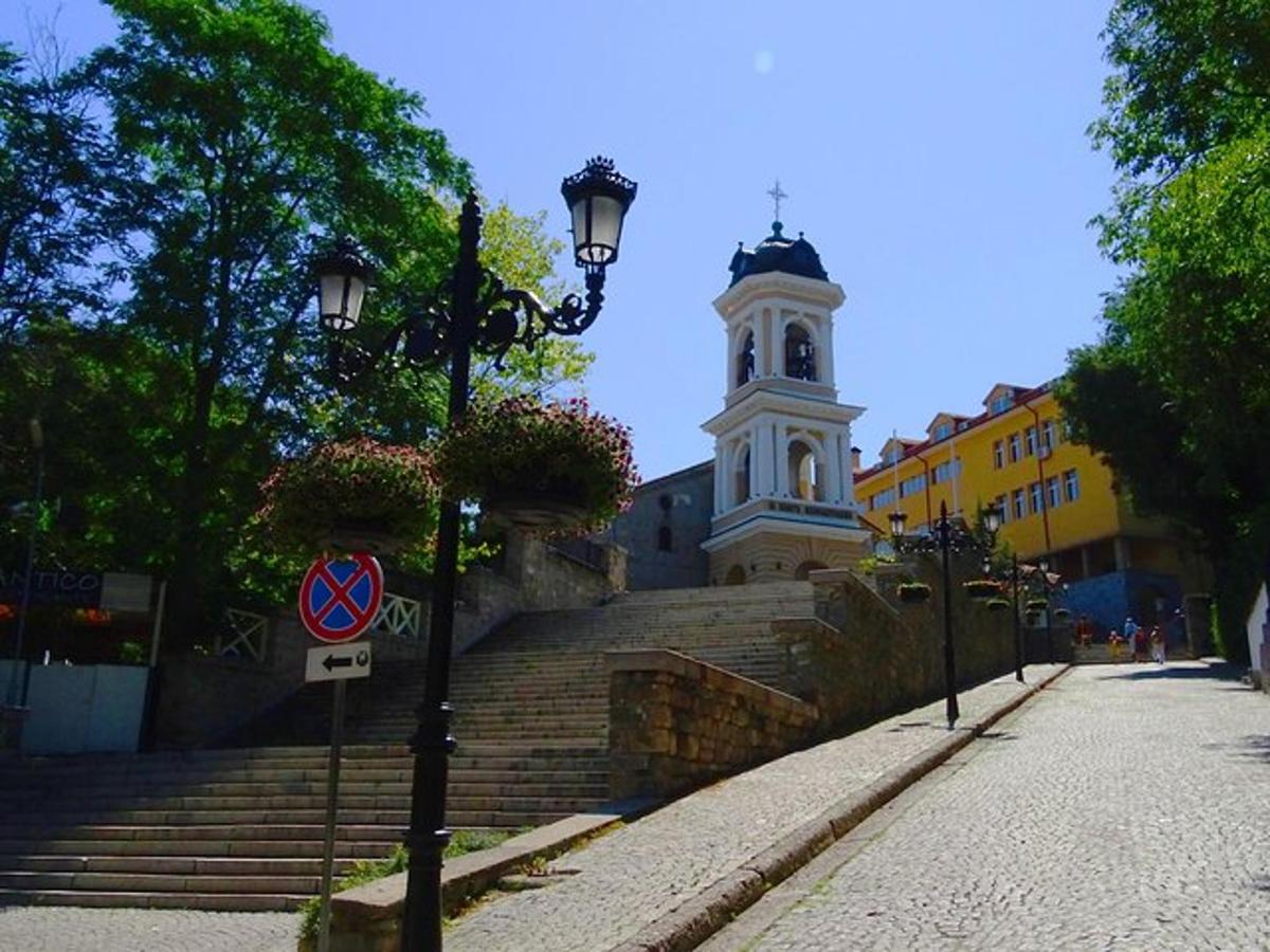 a building with a steeple and a clock tower