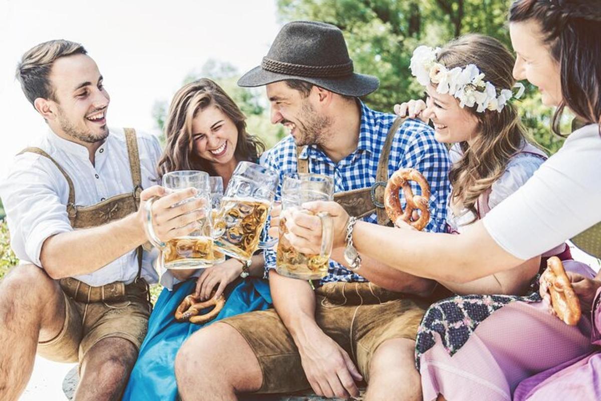 a group of people sitting around drinking beer