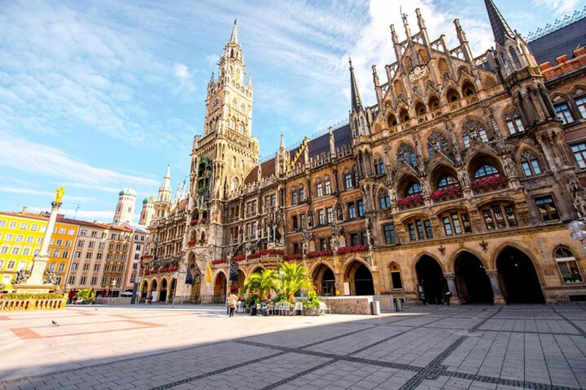 a large building with a clock tower in a city