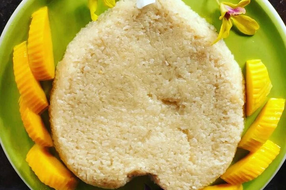 a plate with a piece of bread and slices of pineapple