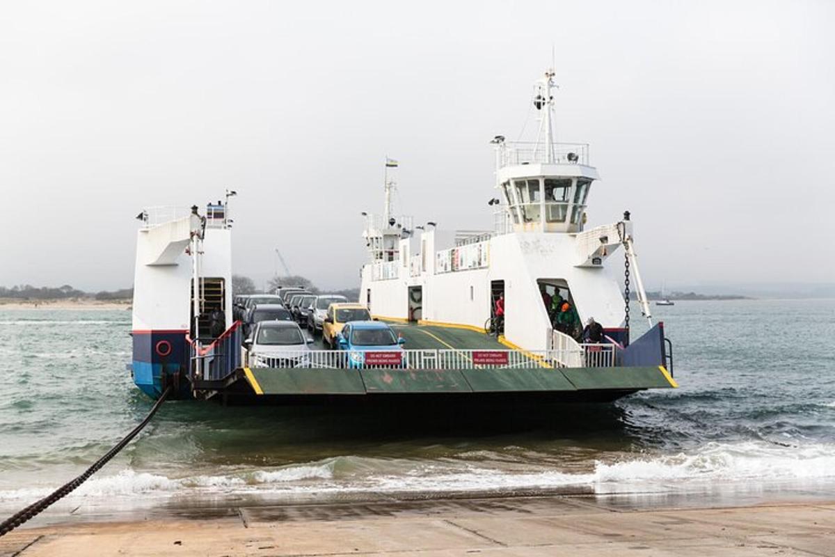 a ferry with cars on it in the water