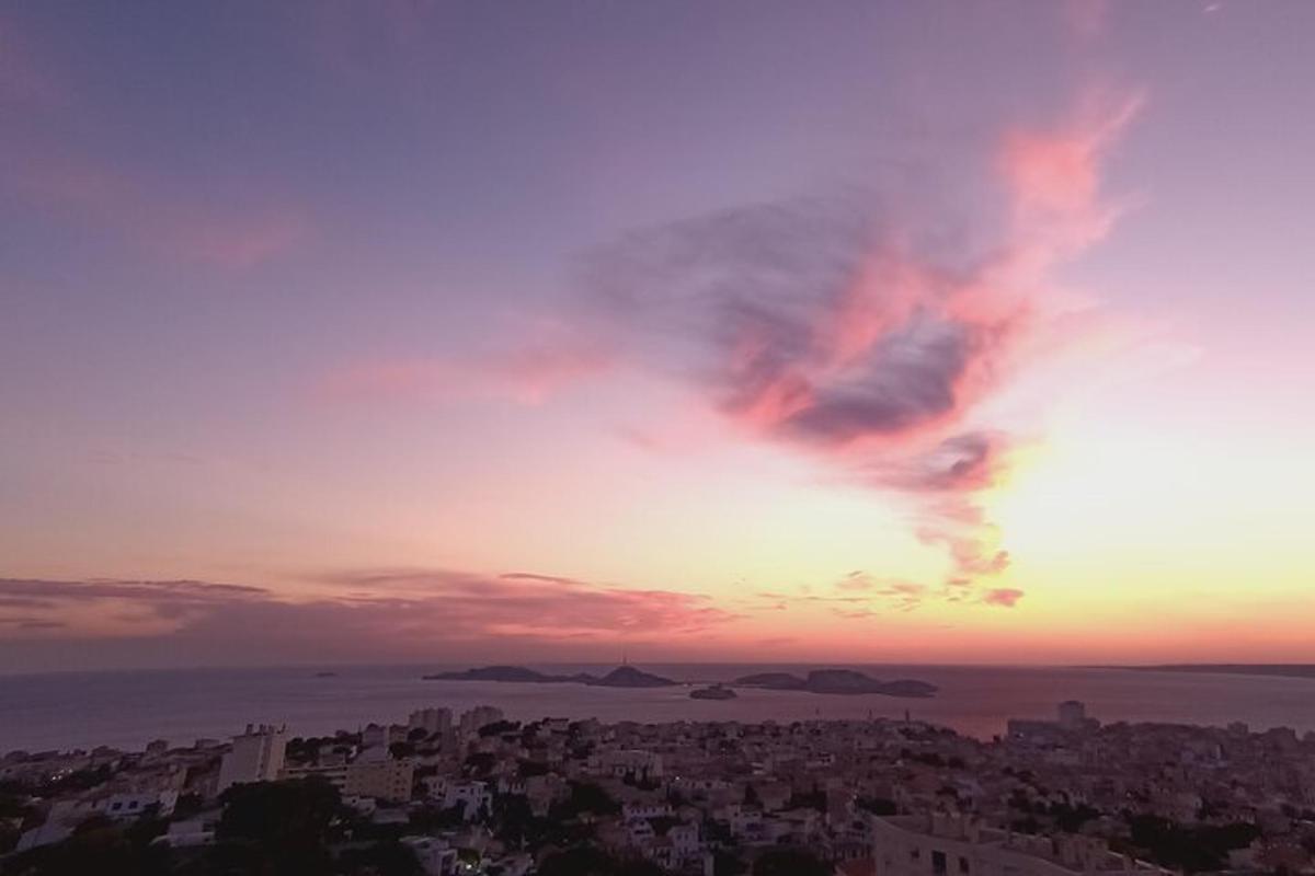 a view of a city at sunset
