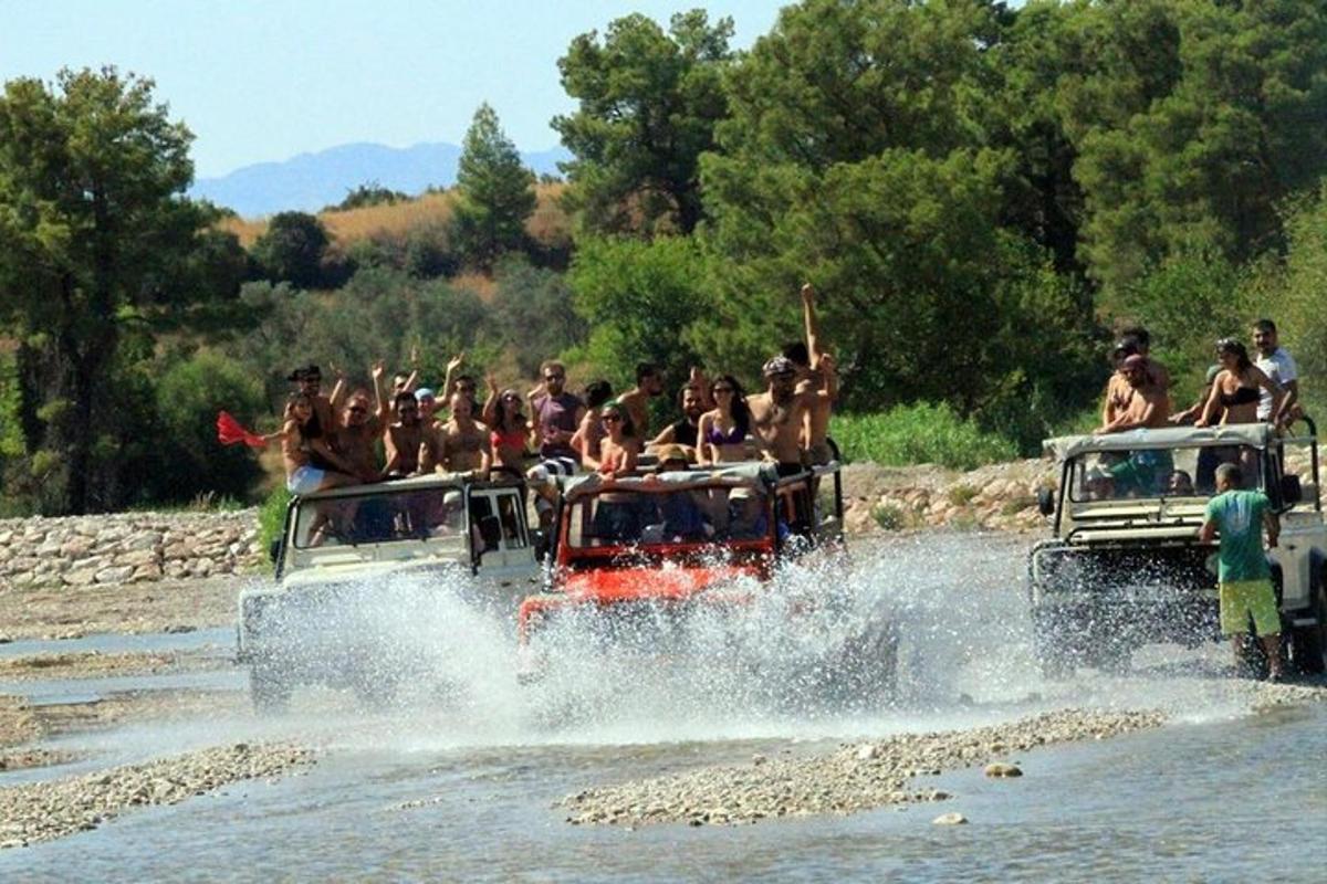 a group of people riding on the back of a riverride