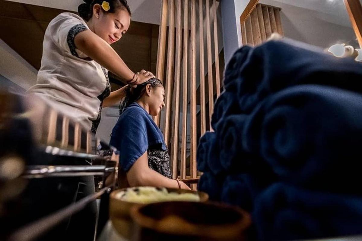 a woman and a girl preparing food in a kitchen