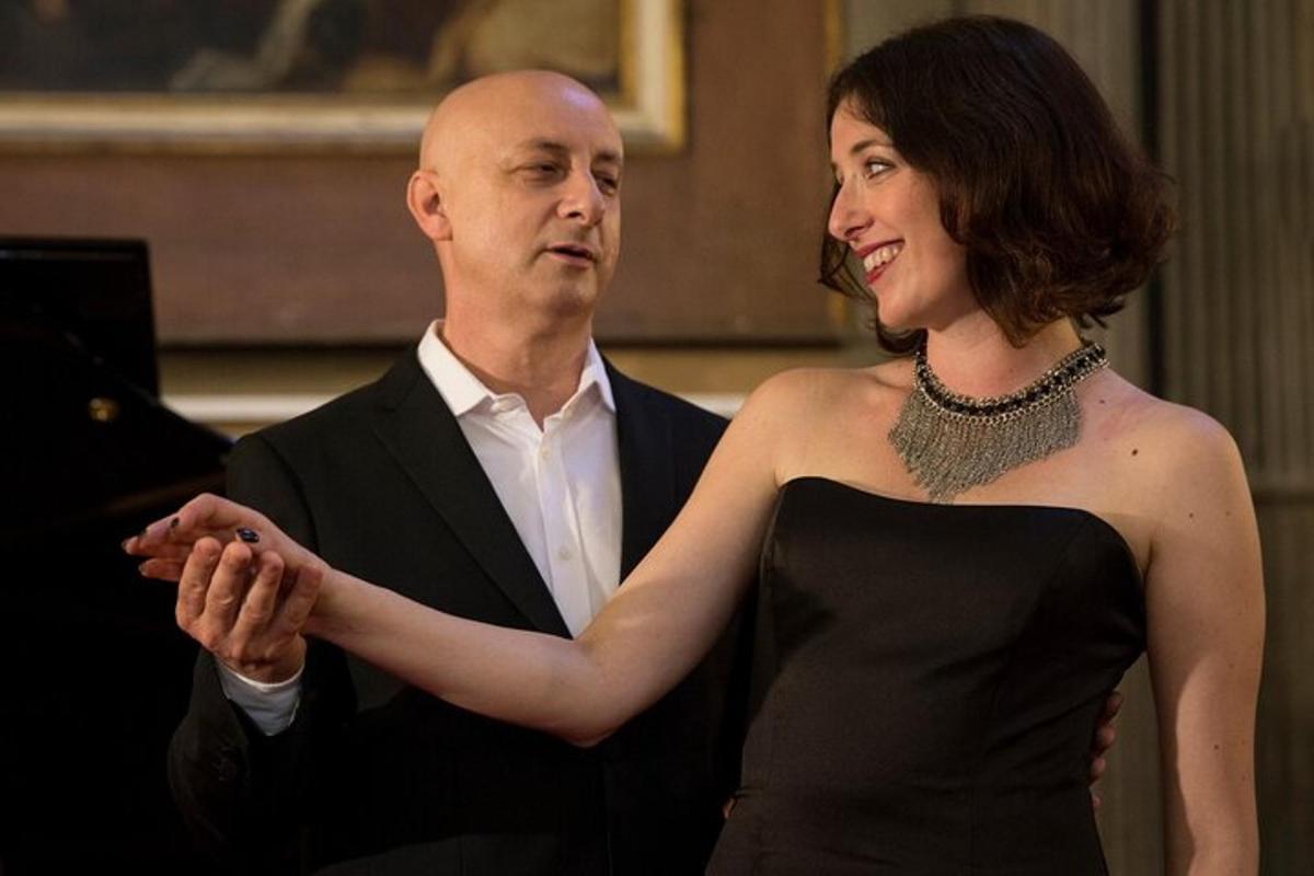 a man and a woman standing next to each other