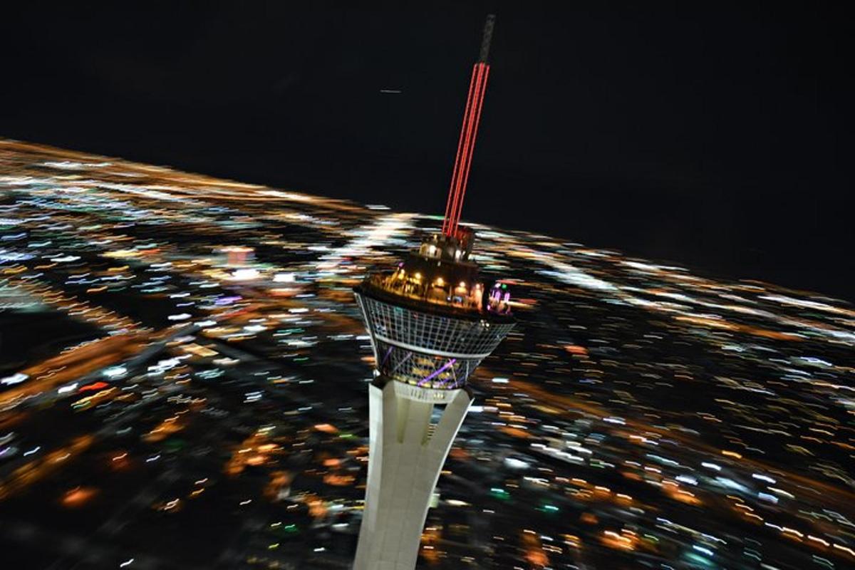 a view of the top of an observation tower at night
