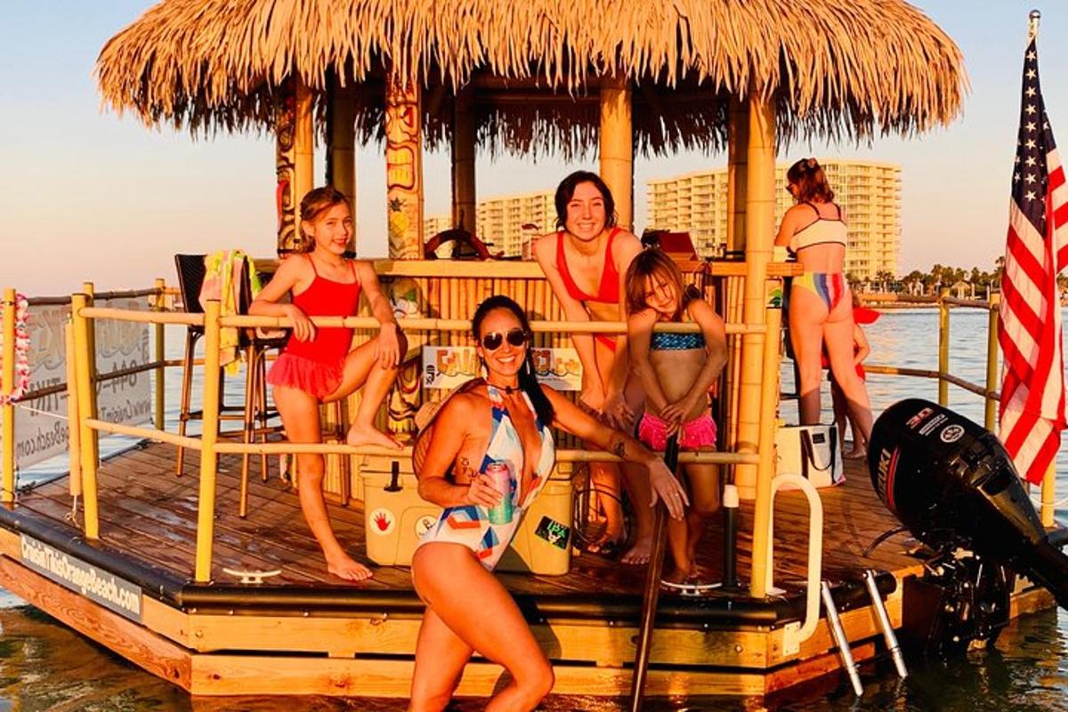a group of women in bathing suits on a pier