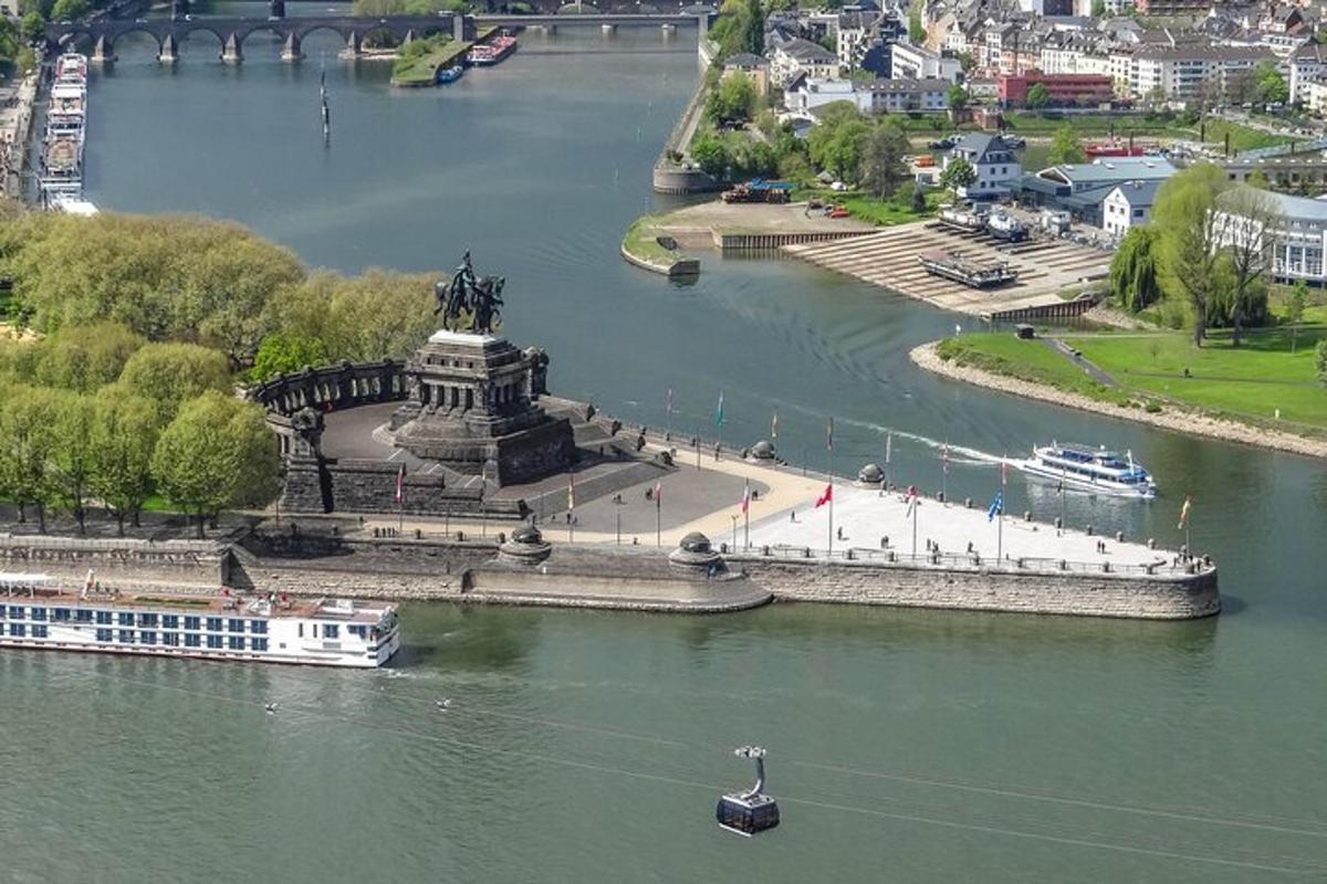 a river with a statue and a boat in the water