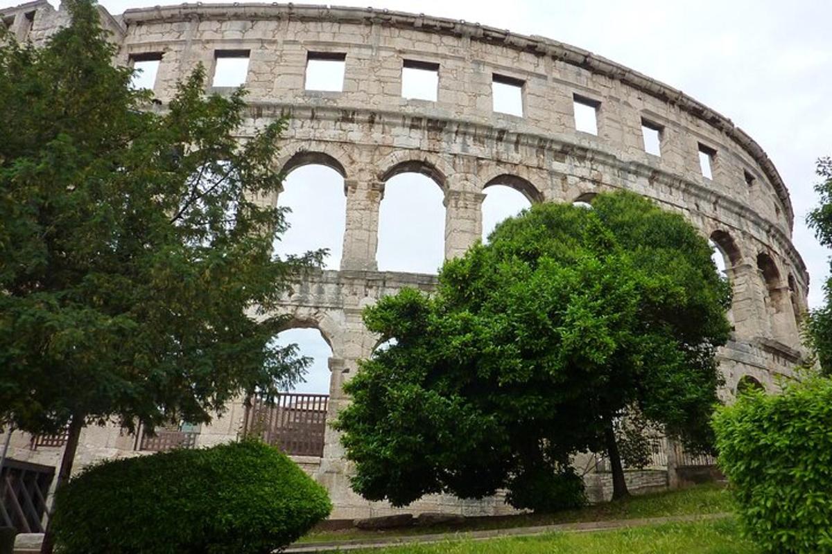 a large stone building with arches on it