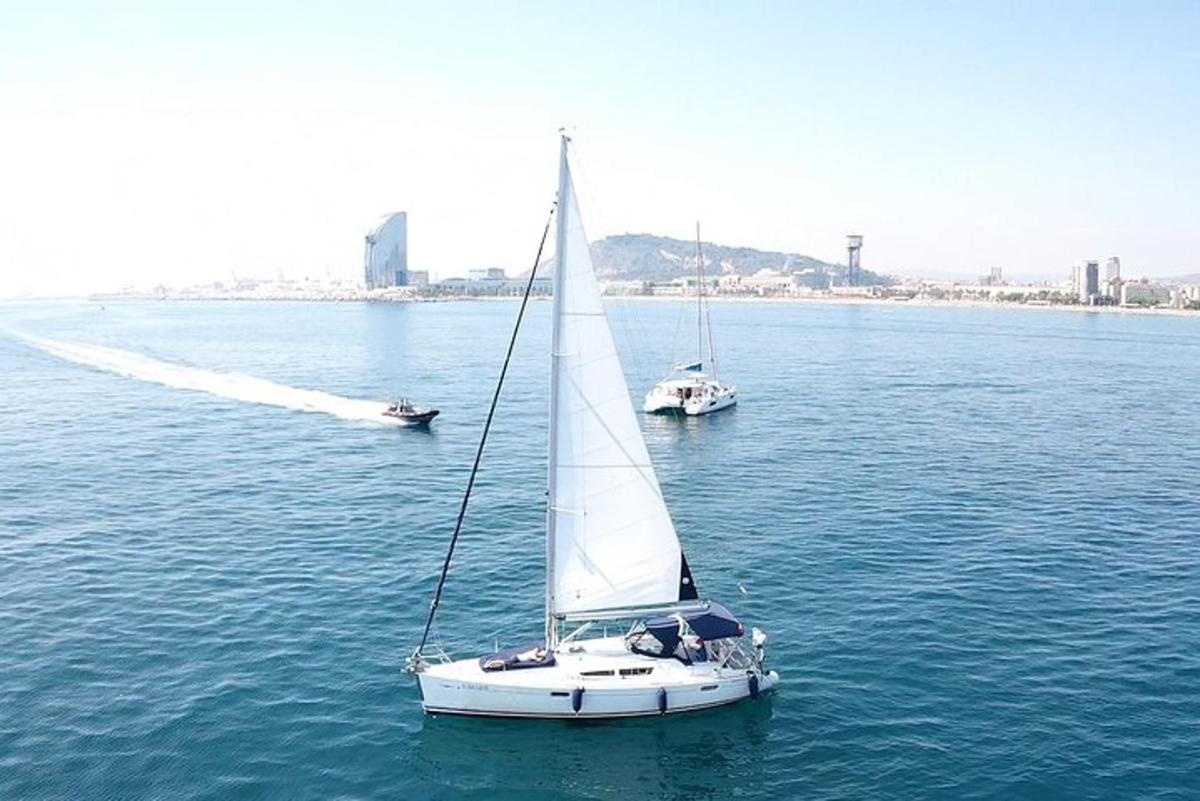 two sailboats in a large body of water