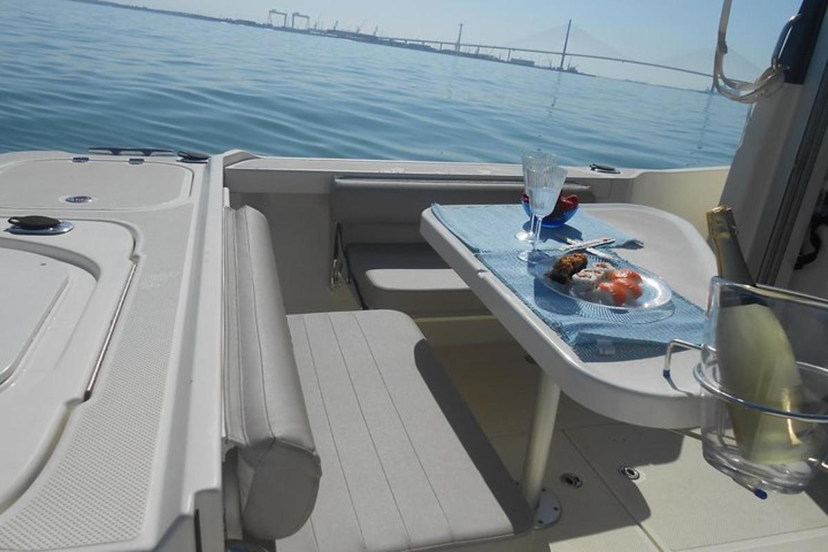 a table on a boat with a plate of food on it