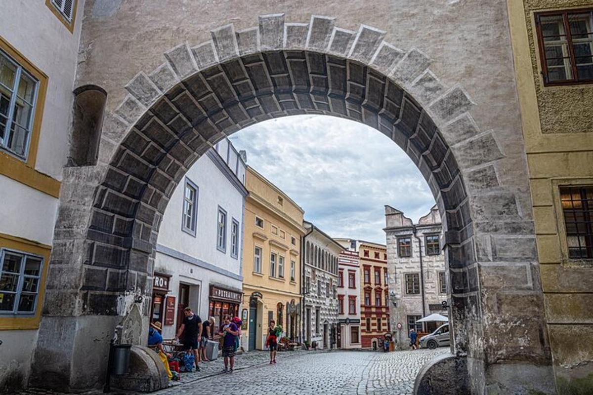 an archway over a street in a city