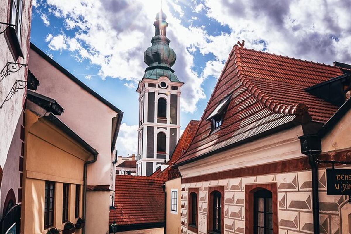 a church with a clock tower in a town
