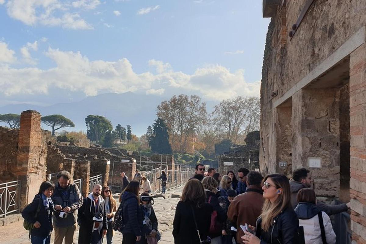 a crowd of people standing outside of a building