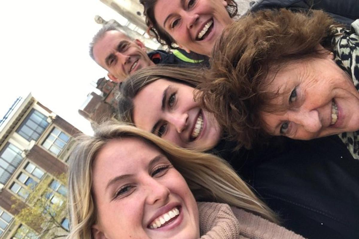 a group of people are posing for a picture