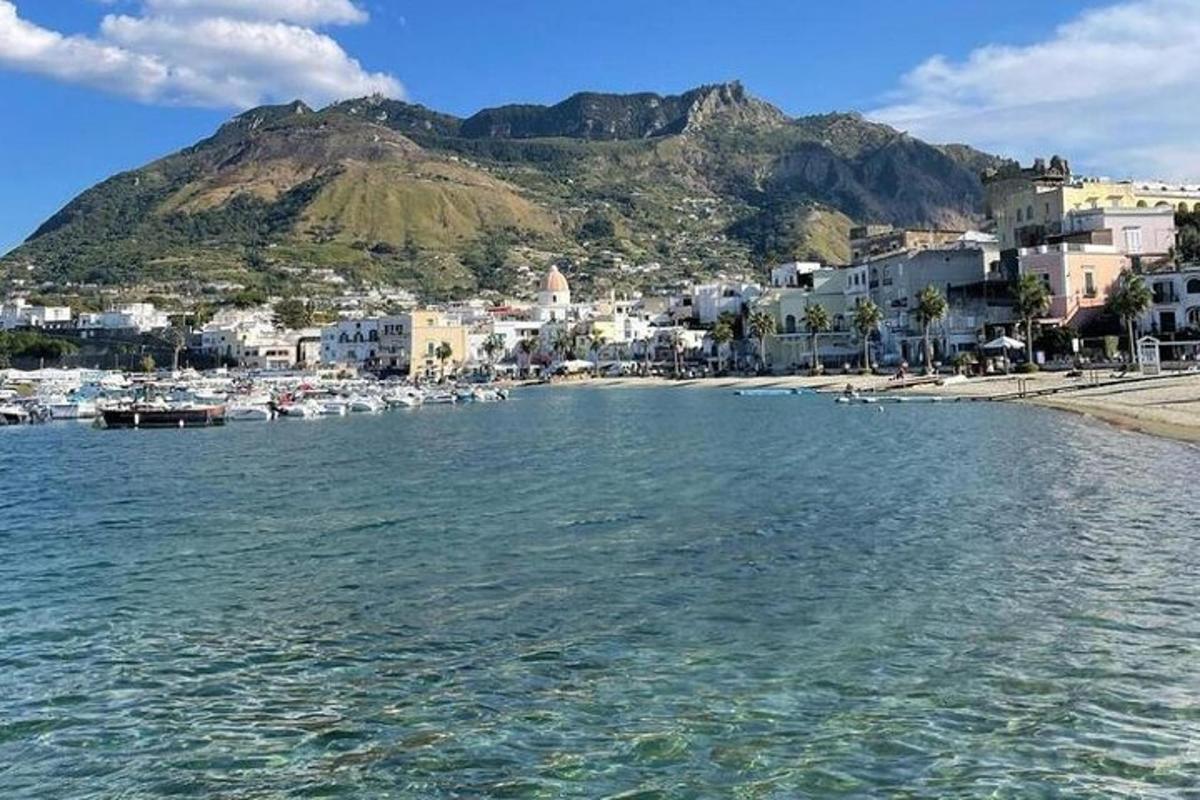 a view of a beach with boats in the water