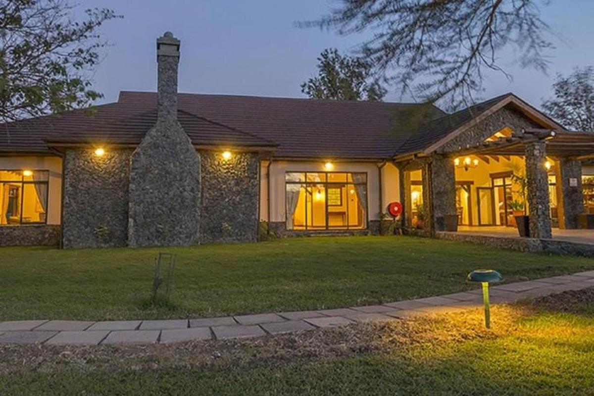 a house with a lawn in front of it