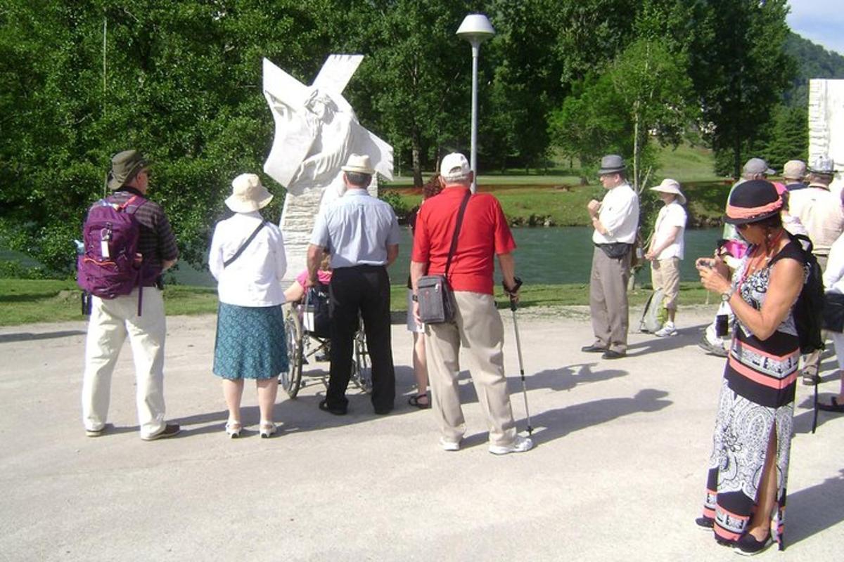 a group of people standing around a statue of a star
