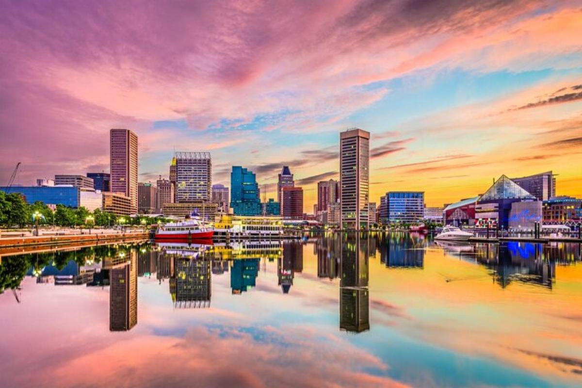 a view of a city skyline at sunset