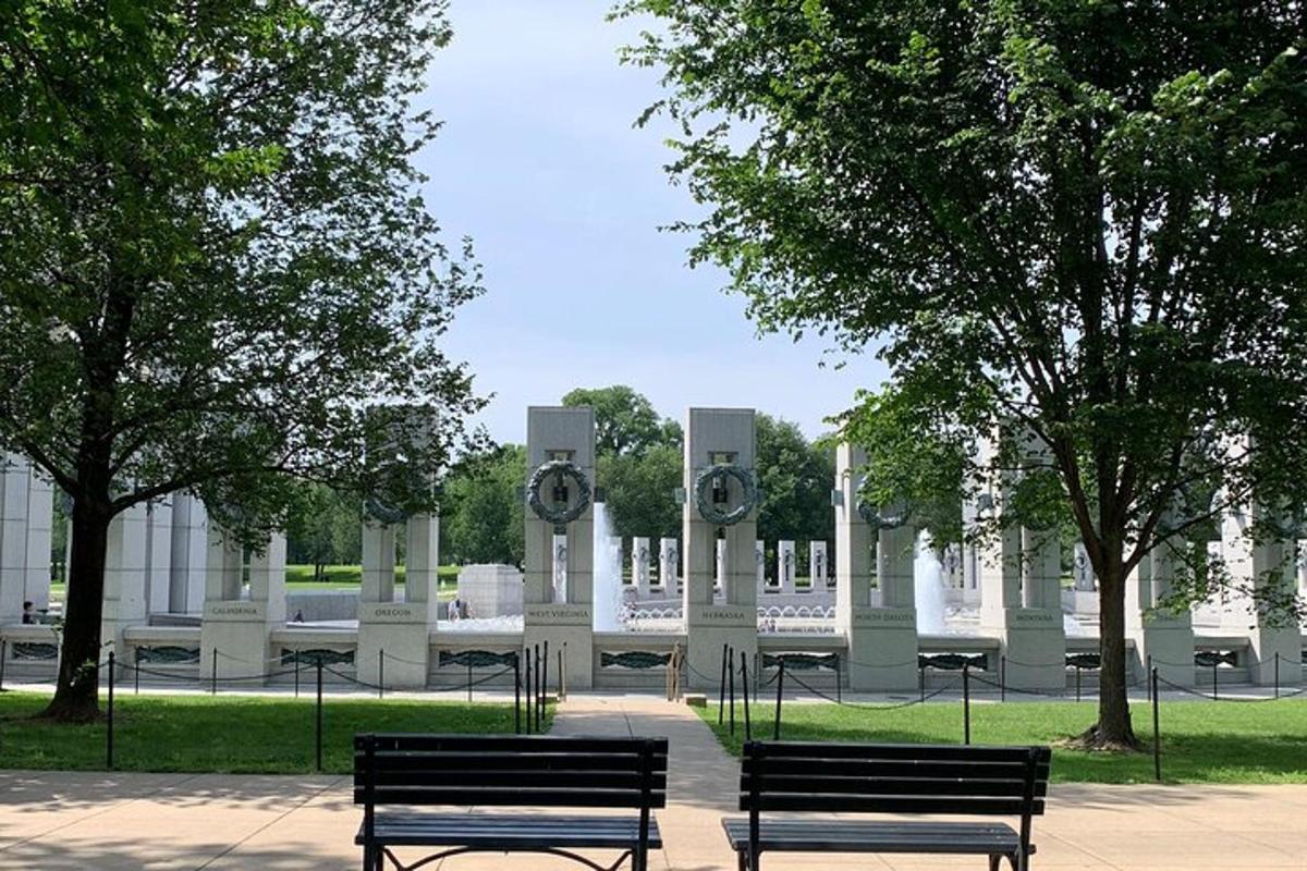 two benches sitting in front of a building