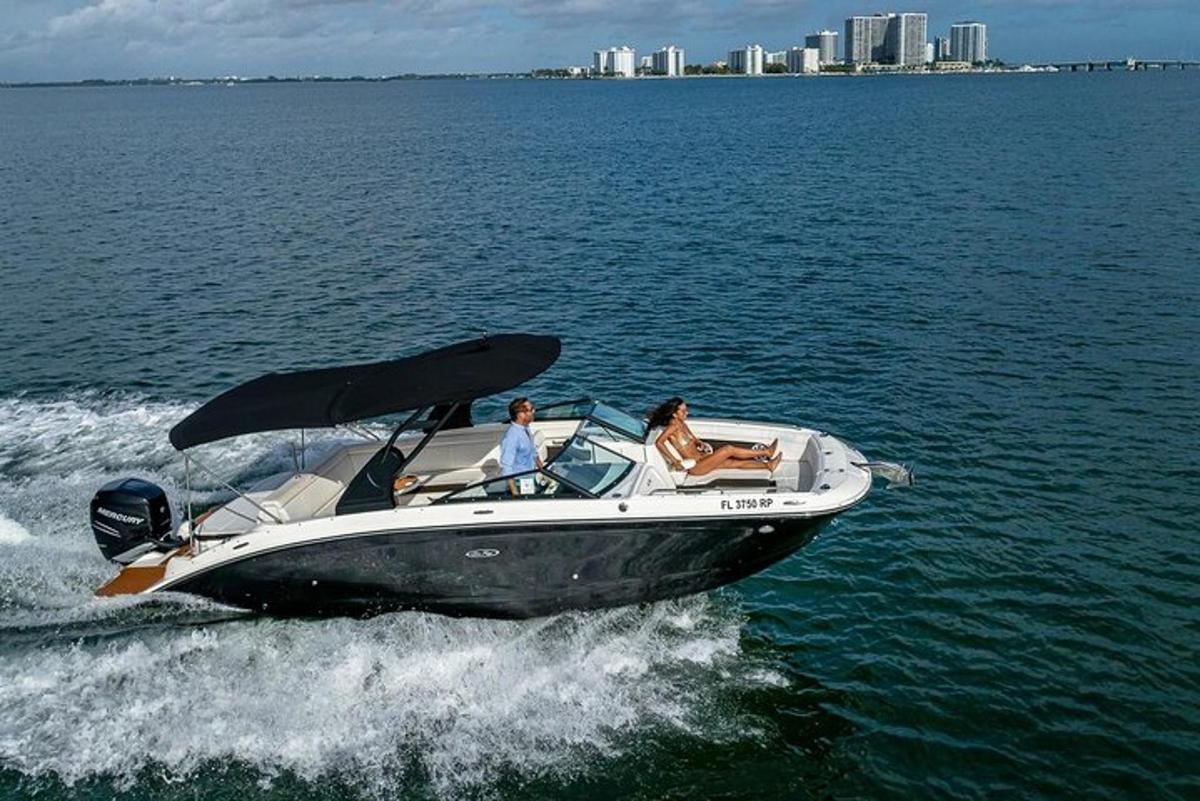 two people in a boat on the water
