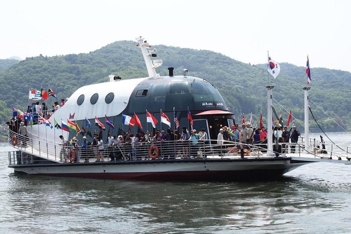 a group of people on a boat in the water